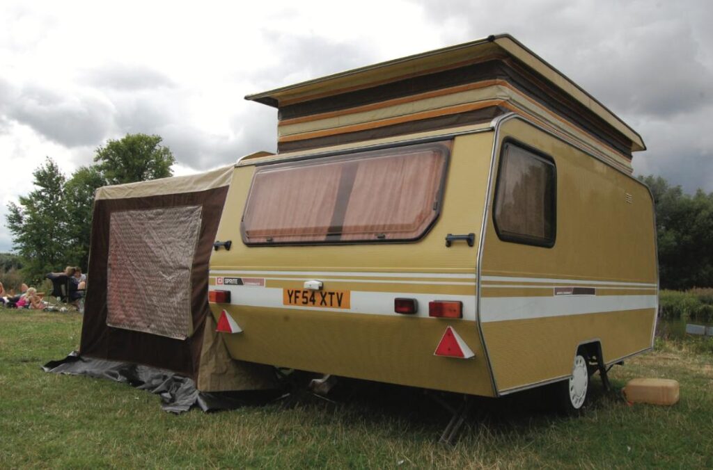 A caravan with pop-top roof