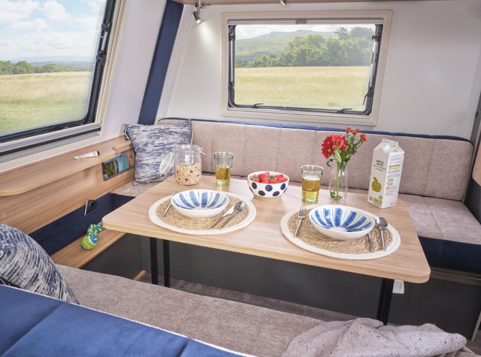 caravan interior with pop up dining table