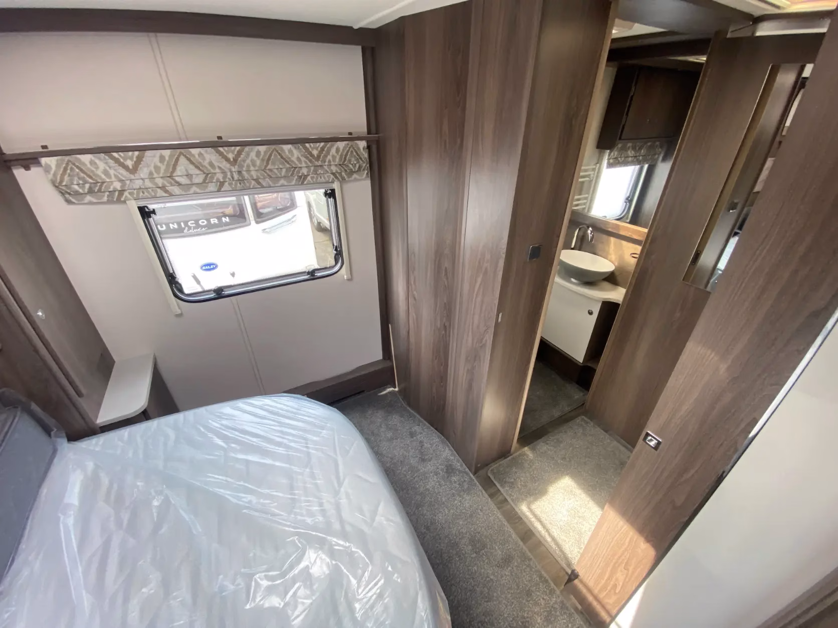2024 Coachman Laser 545 Xtra bedroom washroom view